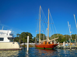 A wooden sail boat in Deltaville VA